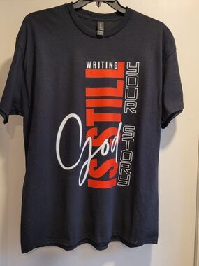 God Is Still Writing Your Story Black with Red & White Vertical Graphic Tee